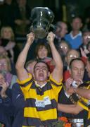 31 October 2004; Mark Prendergast, Na Pairsaigh, lifts the cup after the win against Cloyne. Cork County Senior Hurling Final, Na Piarsaigh v Cloyne, Pairc Ui Chaoimh, Cork. Picture credit; Matt Browne / SPORTSFILE