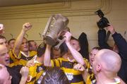 31 October 2004; Na Pairsaigh players celebrate with the cup after the win against Cloyne. Cork County Senior Hurling Final, Na Piarsaigh v Cloyne, Pairc Ui Chaoimh, Cork. Picture credit; Matt Browne / SPORTSFILE