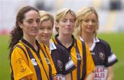 1 November 2004; St. Lachtain's of Freshford, Kilkenny, players Imelda Kennedy, left, and Gillian Dillon Maher, second from right, with Granagh-Ballingarry, Limerick, players Aoife Sheehan, second from left and team-mate Deirdre Sheehan, right, at a photocall ahead of the senior camogie Club Final between Granagh-Ballingarry, Limerick and St. Lachtain's of Freshford, Kilkenny. Croke Park, Dublin. Picture credit; Damien Eagers / SPORTSFILE