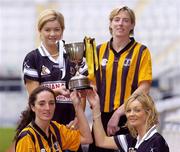 1 November 2004; Aoife Sheehan, Granagh-Ballingarry, Limerick, back left, and Gillian Dillon Maher, St. Lachtain's of Freshford, Kilkenny, back right, with front left, Imelda Kennedy, St. Lachtain's of Freshford, Kilkenny, and Deirdre Sheehan, front right, from Granagh-Ballingarry, Limerick, with the Bill Carroll cup, at a photocall ahead of the senior camogie Club Final between Granagh-Ballingarry, Limerick and St. Lachtain's of Freshford, Kilkenny. Croke Park, Dublin. Picture credit; Damien Eagers / SPORTSFILE