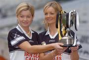 1 November 2004; Granagh-Ballingarry, Limerick, players Aoife Sheehan, left with her sister Deirdre with the Bill Carroll Cup at a photocall ahead of the senior camogie Club Final between Granagh-Ballingarry, Limerick and St. Lachtain's of Freshford, Kilkenny. Croke Park, Dublin. Picture credit; Ciara Lyster / SPORTSFILE