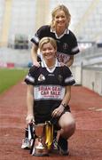 1 November 2004; Aoife Sheehan with her sister Deirdre, back, both from Granagh-Ballingarry, Limerick, with the Bill Carroll Cup at a photocall ahead of the senior camogie Club Final between Granagh-Ballingarry, Limerick and St. Lachtain's of Freshford, Kilkenny. Croke Park, Dublin. Picture credit; Damien Eagers / SPORTSFILE