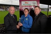 28 October 2013; Galway WFC's Sinead Taylor is presented with the Bus Éireann Women’s National League Player of the Month award for September by Stephen Duane, Service Manager, Bus Éireann, left, and Eamon Naughton, chairman, Bus Éireann Women’s National League. Eamonn Deacy Park, Galway. Picture credit: Diarmuid Greene / SPORTSFILE