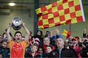 27 October 2013; Castlebar Mitchels captain Donal Newcombe lifts the Moclair Cup. Mayo County Senior Club Football Championship Final, Castlebar Mitchels v Breaffy, Elverys MacHale Park, Castlebar, Co. Mayo. Picture credit: David Maher / SPORTSFILE