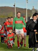 27 October 2013; Rathnew captain Peter Dignam with his nephew Conor Dignam, three years old, during the prade. Wicklow County Senior Club Football Championship Final, Baltinglass v Rathnew, County Grounds, Aughrim, Co. Wicklow. Picture credit: Matt Browne / SPORTSFILE