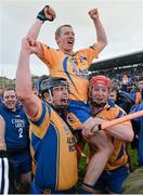 28 October 2013; Portumna captain Ollie Canning, left, is held aloft by his brother, and team-mate, Joe Canning, right, and Kevin Hayes, left, after victory over Loughrea. Galway County Senior Club Hurling Championship Final, Portumna v Loughrea, Pearse Stadium, Galway. Picture credit: Diarmuid Greene / SPORTSFILE