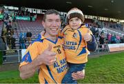28 October 2013; Portumna's Niall Hayes, celebrates with his son Daragh, aged 4, after victory over Loughrea. Galway County Senior Club Hurling Championship Final, Portumna v Loughrea, Pearse Stadium, Galway. Picture credit: Diarmuid Greene / SPORTSFILE