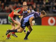 28 October 2013; Declan Donnelly, St Jude's, in action against Eoin Dolan, Ballymun Kickhams. Dublin County Senior Club Football Championship semi-final, Ballymun Kickhams v St Jude's, Parnell Park, Dublin. Picture credit: Daire Brennan / SPORTSFILE