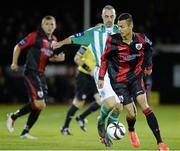 28 October 2013; Dean Ebbe, Longford Town, in action against Gary Dempsey Bray Wanderers. Airtricity League Promotion / Relegation Play-Off Final 1st Leg, Bray Wanderers v Longford Town, Carlisle Grounds, Bray, Co. Wicklow. Picture credit: David Maher / SPORTSFILE