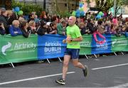 28 October 2013; Martin Kearns, from Dublin, during the Airtricity Dublin Marathon 2013. Merrion Square, Dublin. Picture credit: Stephen McCarthy / SPORTSFILE