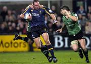 5 November 2004; Ciaran Potts, Leinster, is tackled by Matt Lacey and Darren Yapp (right), Connacht. Celtic League 2004-2005, Leinster v Connacht, Donnybrook, Dublin. Picture credit; Brian Lawless / SPORTSFILE