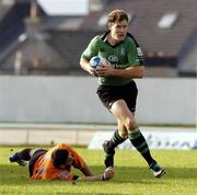 30 October 2004; Matt Mostyn, Connacht, skips past the  challenge of Julien Candelon, Narbonne. European Challenge Cup, Connacht v Narbonne, 2nd Leg,  Sportsground, Galway. Picture credit; Damien Eagers / SPORTSFILE