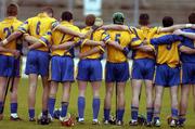31 October 2004; The Portumna players link arms for the national anthem. Galway County Senior Hurling Final, Portumna v Athenry, Pearse Stadium, Galway. Picture credit; Damien Eagers / SPORTSFILE