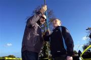 4 November 2004; Terry McHugh shows student Stephen O'Neill how to throw the javelin. Arklow Community College, Arklow, Co. Wicklow. Picture credit; Damien Eagers / SPORTSFILE