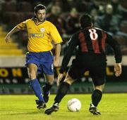 6 November 2004; Alan Moore, Shelbourne, in action against Dean Fitzgerald, Longford Town. eircom league, Premier Division, Longford Town v Shelbourne, Flancare Park, Longford. Picture credit; David Maher / SPORTSFILE