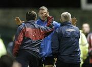 6 November 2004; Thge Shelbourne manager Pat Fenlon, left, and his assistant Eamon Collins, remonstrate with 4th official Tony Kelly, at the end of the first half. eircom league, Premier Division, Longford Town v Shelbourne, Flancare Park, Longford. Picture credit; David Maher / SPORTSFILE