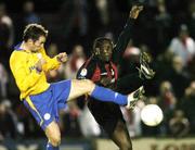 6 November 2004; Eric Levine, Longford Town, in action against Ollie Cahill, Shelbourne. eircom league, Premier Division, Longford Town v Shelbourne, Flancare Park, Longford. Picture credit; David Maher / SPORTSFILE