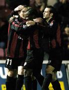 6 November 2004; Sean Prunty, left, Longford Town, celebrates after scoring his sides third goal with team-mates Eric Levine, centre and John Martin. eircom league, Premier Division, Longford Town v Shelbourne, Flancare Park, Longford. Picture credit; David Maher / SPORTSFILE