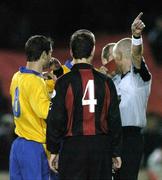 6 November 2004; Referee Dave Hanney shows the red card to Alan Moore, left, Shelboune, during the second half. eircom league, Premier Division, Longford Town v Shelbourne, Flancare Park, Longford. Picture credit; David Maher / SPORTSFILE