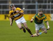 7 November 2004; John Gardiner, Na Piarsaigh, in action against Francis Devanney, Toomevara. AIB Munster Club Senior Hurling Championsip, Toomevara v Na Piarsiagh, Semple Stadium, Thurles. Picture credit; Damien Eagers / SPORTSFILE