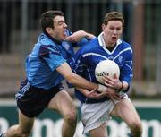 7 November 2004; Jamie Jordan, Skryne, is tackled by John Doyle, Allenwood. AIB Leinster Club Senior Football Championsip, Allenwood v Skryne, St. Conleth's Park, Newbridge, Co. Kildare. Picture credit; Ray McManus / SPORTSFILE