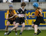 7 November 2004; Ber Chawke, Granagh-Ballingarry, in action against Margaret Kavanagh, right, and Marie O'Connor, St. Lachtains Freshford. All-Ireland Senior Camogie Club Final, Granagh-Ballingarry v St. Lachtains Freshford, Parnell Park, Dublin. Picture credit; Brian Lawless / SPORTSFILE