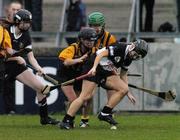 7 November 2004; Aoife Sheehan, Granagh-Ballingarry, in action against Esther Kennedy, St. Lachtains Freshford. All-Ireland Senior Camogie Club Final, Granagh-Ballingarry v St. Lachtains Freshford, Parnell Park, Dublin. Picture credit; Brian Lawless / SPORTSFILE