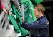 29 October 2013; Ireland's Andrew Trimble signs autographs following an Ireland Open Training Session ahead of their Guinness Series International game against Samoa, on Saturday 9 November. Aviva Stadium, Lansdowne Road, Dublin. Picture credit: Stephen McCarthy / SPORTSFILE