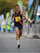 28 October 2013; Sergiu Ciobanu, Clonliffe Harriers A.C, on his way to finish in third place, during the Airtricity Dublin Marathon 2013. Nassau street, Dublin. Picture credit: Tomás Greally / SPORTSFILE