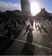 28 October 2013; Participants make their way across O'Connell Bridge during the Airtricity Dublin Marathon 2013. O'Connell Bridge, Dublin. Picture credit: Pat Murphy / SPORTSFILE