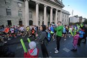 28 October 2013; Participants make their way past the Airtricity Cheer Squad during the Airtricity Dublin Marathon 2013. O'Connell Street, Dublin. Picture credit: Pat Murphy / SPORTSFILE