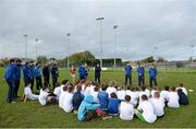 30 October 2013; Leinster Academy players, from left, Jordan Coghlan, Edward Byrne and Sam Coghlan Murray speaking to participants at a Leinster School of Excellence. Leinster School of Excellence on Tour in Railway Union RFC, Dublin. Picture credit: Brendan Moran / SPORTSFILE