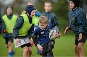 30 October 2013; Aidan Kelly in action against Aoife Wafer during a Leinster School of Excellence on tour in Gorey RFC, Co. Wexford. Picture credit: Matt Browne / SPORTSFILE