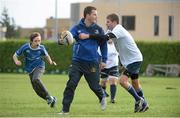 30 October 2013; Leinster Academy player Sam Coghlan Murray is tackled by participant Cillian O'Neill during a Leinster School of Excellence. Leinster School of Excellence on Tour in Railway Union RFC, Dublin. Picture credit: Brendan Moran / SPORTSFILE