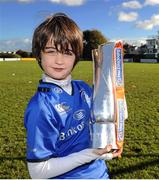 31 October 2013;  Ben McDermott with the RaboDirect Pro 12 trophy at a Leinster School of Excellence on tour in Blackrock College, Blackrock, Co. Dublin. Picture credit: Ramsey Cardy / SPORTSFILE