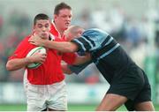 27 September 1997; Alan Quinlan, Munster, is tackled by Derwyn Jones, Cardiff. European Rugby Cup, Munster v Cardiff, Thomond Park, Limerick. Picture credit: Matt Browne / SPORTSFILE