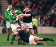 1 March 1997; Ireland's Paddy Johns in action against Scotland's Ian Smith and Peter Walton. Five Nations Championship, Scotland v Ireland, Murrayfield, Edinburgh, Scotland. Rugby. Picture credit; Ray McManus / SPORTSFILE