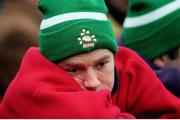 15 February 1997; An Ireland supporter watches the closing stages of the game. Five Nations Rugby Championship, Ireland v England, Lansdowne Road, Dublin. Picture credit: David Maher / SPORTSFILE
