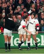 15 February 1997; England's Tony Underwood  celebrates with team-mate Jonathan Sleightholme, left, after scoring his second try of the game. Five Nations Rugby Championship, Ireland v England, Lansdowne Road, Dublin. Picture credit: Brendan Moran / SPORTSFILE