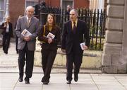 9 November 2004; Elaine Fitzgerald, Performance Director, Athletics Association of Ireland, Liam Hennessy, International Secretary, left, and Michael Heery, President of the Athletics Association of Ireland make their way to a press briefing to announce the Athletics International Programme for 2005. Parnell Square, Dublin. Picture credit; Brian Lawless / SPORTSFILE