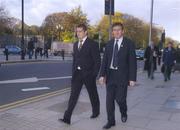 10 November 2004; Munster's Marcus Horan, left, accompanied by Munster PRO Pat Geraghty arriving at the ERC Headquarters, Huguenot House, St. Stephen's Green, Dublin, to appear before an independent Disciplinary Committee to hear the citing complaint lodged by Neath-Swansea Ospreys against him following the Heineken Cup Pool 4, Round 2, match played at The Gnoll on Sunday 31 October. Picture credit; Brian Lawless / SPORTSFILE