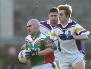 13 November 2004; Patrick Mulvihill, Garrycastle, in action against Paul Griffin, Kilmacud Crokes. AIB Leinster Club Football Championship, Quarter-Final, Kilmacud Crokes v Garrycastle, Parnell Park, Dublin. Picture credit; Brian Lawless / SPORTSFILE