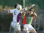 13 November 2004; Justin McAteer, Garrycastle, in action against Conor Murphy, Kilmacud Crokes. AIB Leinster Club Football Championship, Quarter-Final, Kilmacud Crokes v Garrycastle, Parnell Park, Dublin. Picture credit; Brian Lawless / SPORTSFILE