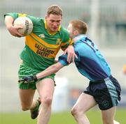 14 November 2004; Brendan O'Boyle, Ardara, is tackled by Adrian Barry, Mayobridge. AIB Ulster Senior Club Football Championship Quarter Final Replay, Mayobridge v Ardara, Newry, Co. Down. Picture credit; David Maher / SPORTSFILE