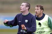 15 November 2004; Stephen Elliott, left, Republic of Ireland, in action with team-mate Kenny Cunningham during squad training. Malahide FC, Malahide, Co. Dublin. Picture credit; David Maher / SPORTSFILE