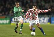 16 November 2004; Markco Babic, Croatia, in action against Steve Finnan, Republic of Ireland. International Friendly, Republic of Ireland v Croatia, Lansdowne Road, Dublin. Picture credit; Damien Eagers / SPORTSFILE