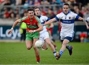 3 November 2013; Kevin Leahy, Ballymun Kickhams, in action against Ger Brennan, St Vincent's. Dublin County Senior Football Championship Final, Ballymun Kickhams v St Vincent's, Parnell Park, Dublin. Picture credit: Ray McManus / SPORTSFILE