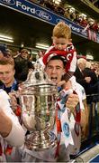 3 November 2013; Sligo Rovers' Aaron Greene, and his 4 year old son Jack, celebrates with the FAI Ford Cup after the game. FAI Ford Cup Final, Drogheda United v Sligo Rovers, Aviva Stadium, Lansdowne Road, Dublin. Photo by Sportsfile
