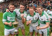 3 November 2013; Kanturk players, from left, Anthony Nash, Aidan Walsh, John McLoughlin and Lorcán McLoughlin celebrate with the cup after victory over Eire Og. Cork County Intermediate Club Hurling Championship Final, Éire Óg v Kanturk, Pairc Ui Chaoimh, Cork. Picture credit: Diarmuid Greene / SPORTSFILE