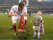 3 November 2013; Aaron Greene, Sligo Rovers, encourages his son Jack, aged 4, to lift the FAI Ford Cup after the game. FAI Ford Cup Final, Drogheda United v Sligo Rovers, Aviva Stadium, Lansdowne Road, Dublin. Picture credit: Brendan Moran / SPORTSFILE